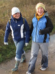 SX11253 Jenni and Annie walking through puddle.jpg